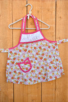 
              Ruched Pink Floral and Coral Apron -Childrens
            