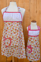 
              Ruched Pink Floral and Coral Apron -Childrens
            